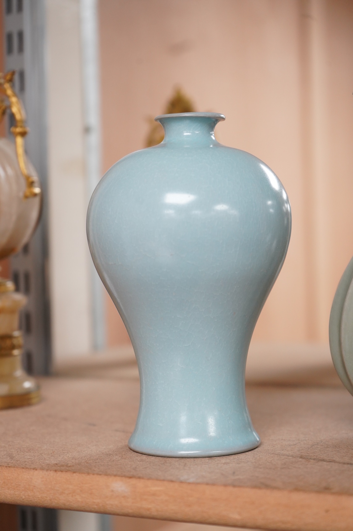 Two Chinese vases comprising a Meiping example and a celadon glazed example, largest 18cm high